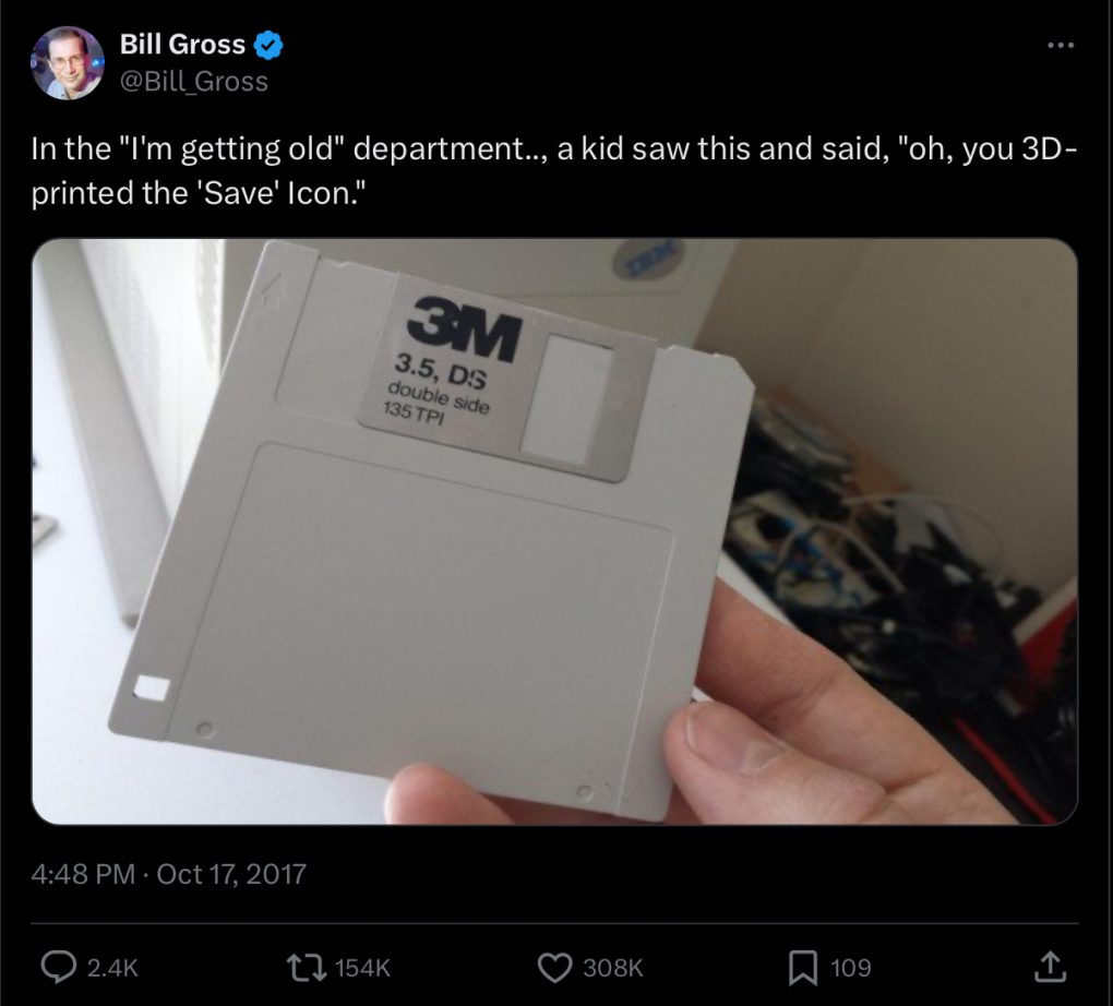 Tweet: kid asked me if I 3D printed the save icon and picture if hand holding floppy disk.