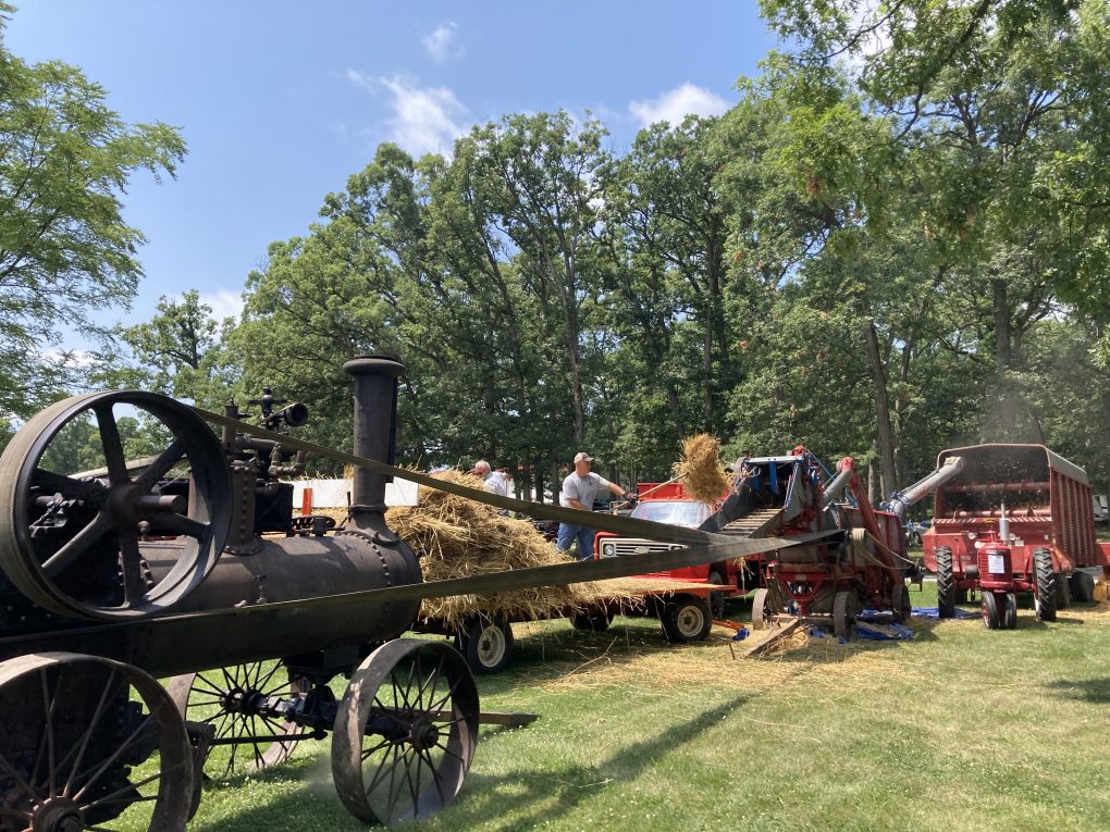 An old fashion threshing machine.